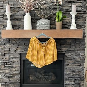 Mustard, white, and‎ black striped shorts